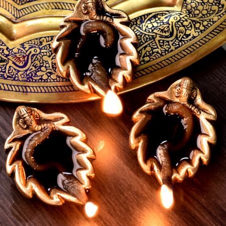 Brass Ganpati And Leaf Shape Diwali Diya Pack of 3 Diyas